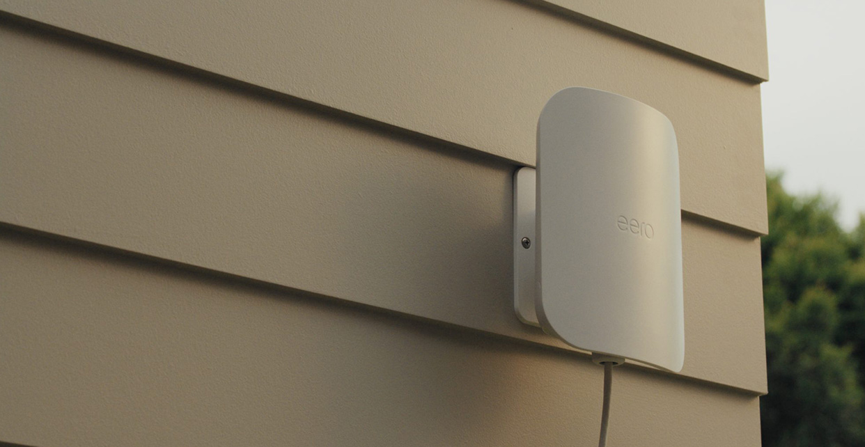 eero Outdoor 7 mounted on house siding